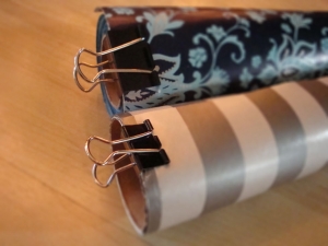 Use binder clips to clip up rolled wrapping papers