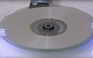 See What Happens When This Guy Tries To Erase a CD With Electricity Volts