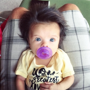 Baby born with glamorous head full of hair is taking the internet by storm