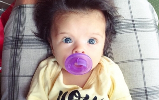 Baby born with glamorous head full of hair is taking the internet by storm